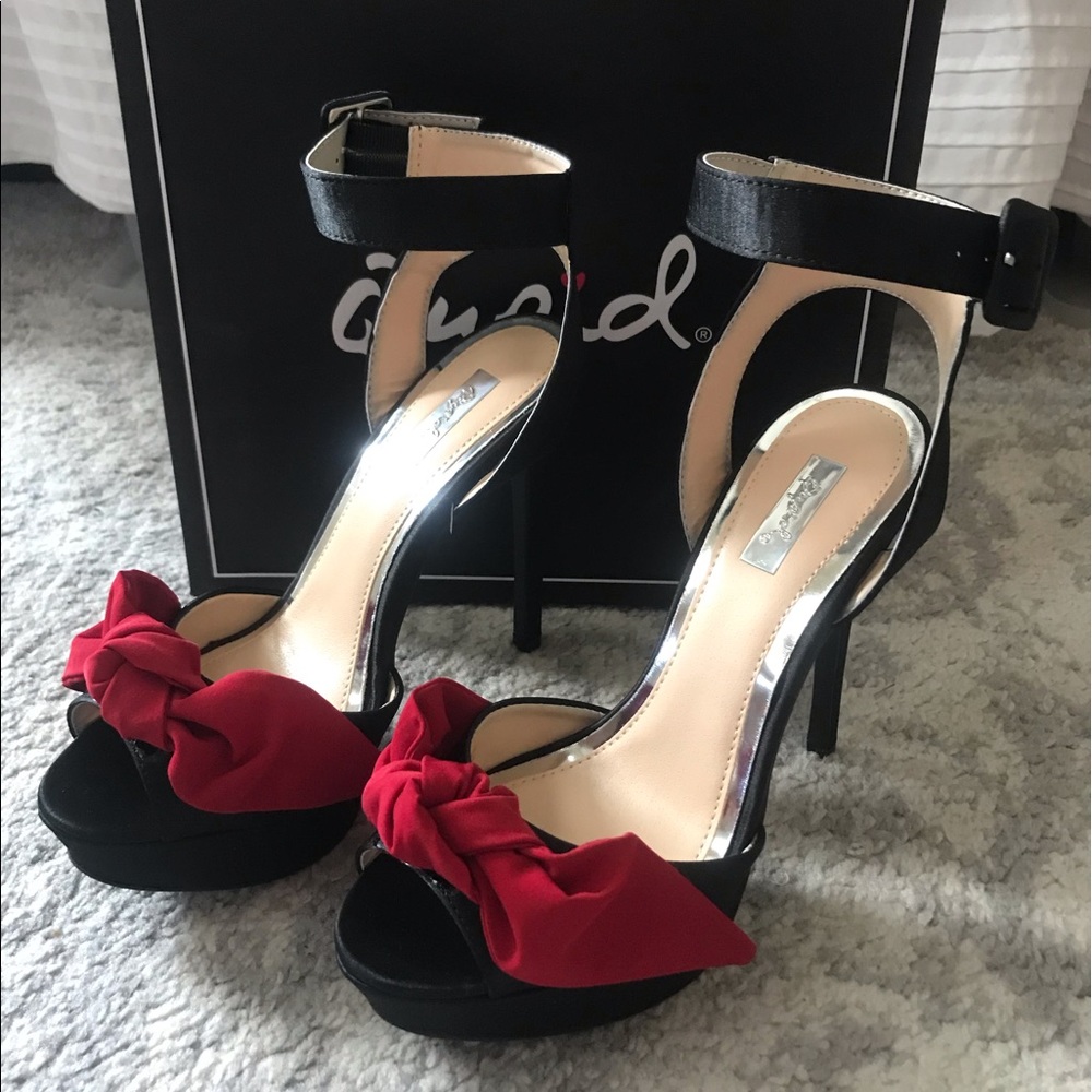 Black Heels with Red Bow on the tie